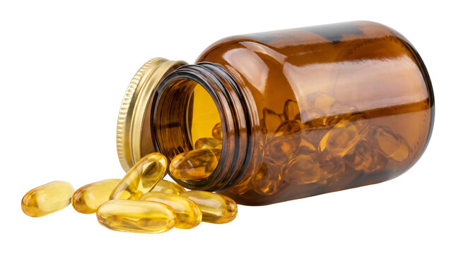 Amber glass bottle of transparent yellow fish oil capsules spilling out, nutritional supplement.