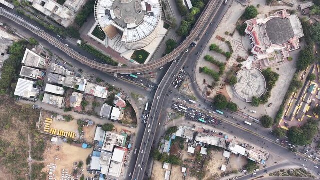 Aerial Shot of Metro & Traffic Running in near Cyber tower, Hyderabad, India