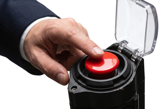 Businessman hand pushing a red emergency button