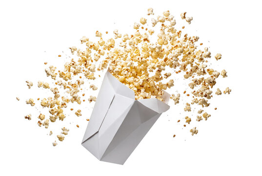 Flying popcorn spilling from white paper box