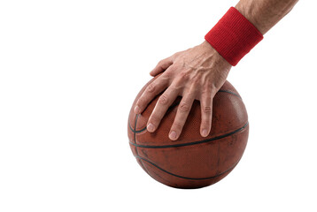 Obraz premium Athlete hand gripping a basketball with red sweatband