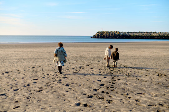children playing on a sandy beach