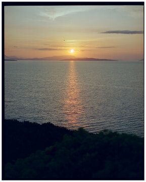 Sunset over the sea in Greece shot on film 