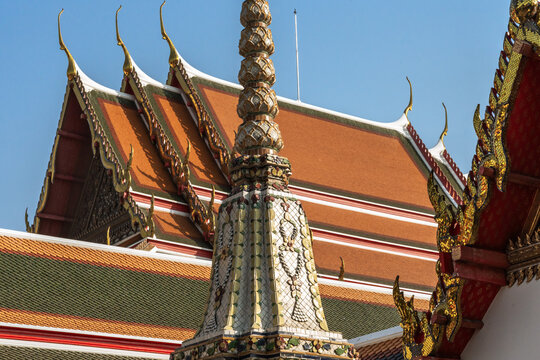 People Admire the Intricate Details of a Temple in Thailand