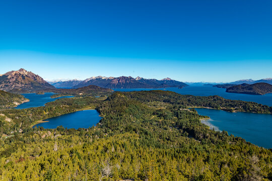Stunning vista from Cerro Campanario featuring Laguna El Trebol, Lago Moreno, Lago Nahuel Huapi, alongside the Llao Llao area and hotel in Bariloche, Argentina.