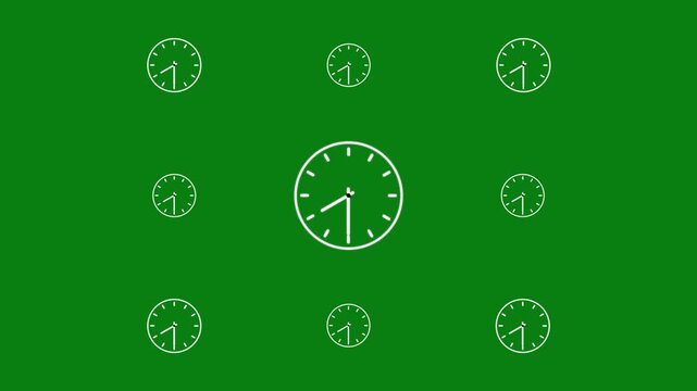 Symmetrical grid of white clock on a solid green background for chroma key compositing work