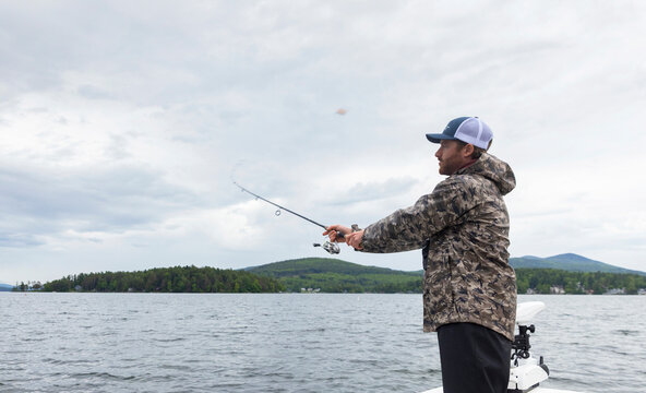 Fishing guide boat cast rod  Lake New Hampshire 
