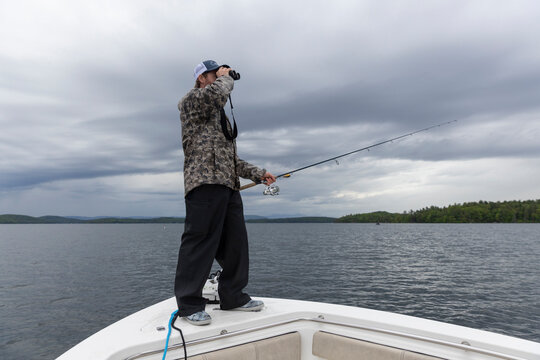 Boat Fisherman Portrait binoculars Lake New Hampshire 