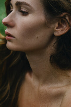 Light Brunette Woman's Portrait in nature