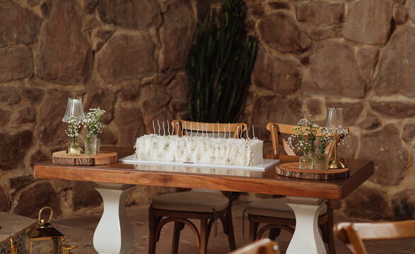 white cake with candles