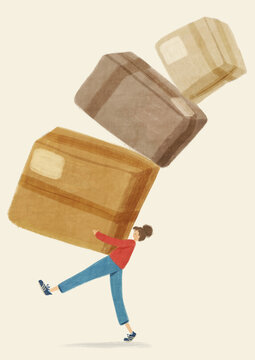 Person walking carrying a large pile of boxes