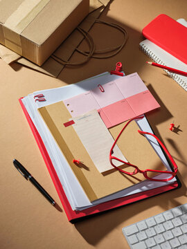Organized desk with planning sheets, stationery, and tech accessories