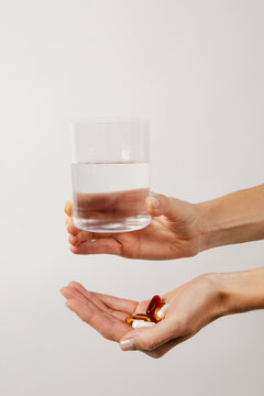 Wellness Morning Routine with Capsules and Water Glass with Lemon
