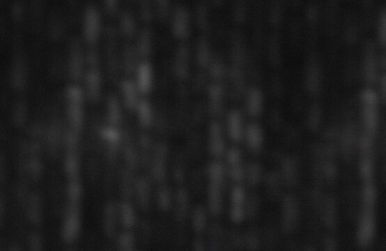 Abstract dark gradient texture with light spots