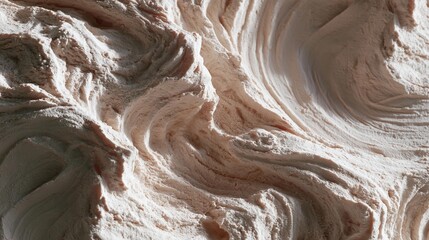 Obraz premium Close-up of a textured surface. the surface appears to be made of a light-colored material, possibly ice cream or meringue.