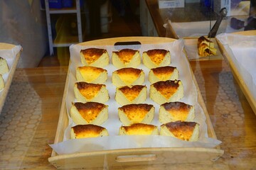 Obraz premium Basque cheesecake pieces sold in San Sebastian, Spain