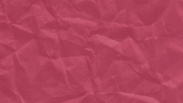 Red crumpled paper texture background, 4k video footage