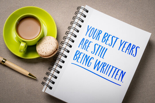 Your Best Years Are Still Being Written &ndash; inspirational handwritten note in a sketchbook with coffee and pen, encouraging hope, personal growth, resilience, and a positive future.