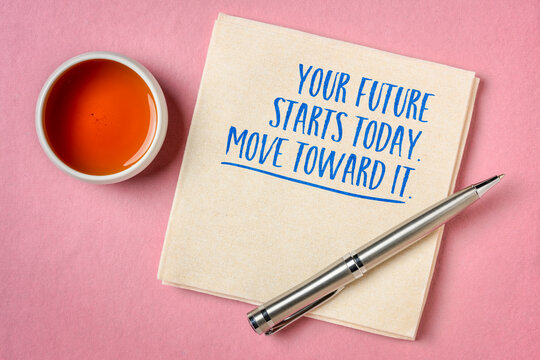 Your Future Starts Today. Move Toward It. &ndash; inspirational handwritten note on a napkin with tea and pen, encouraging purposeful action, optimism, and personal growth.