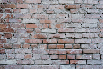 Obraz premium Wall of old, weathered red brick – abstract grunge background