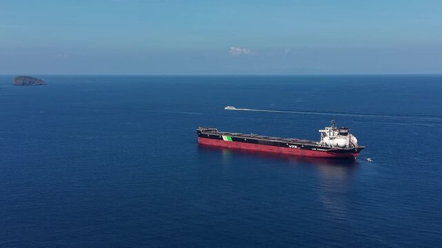 Candidasa, Bali, Indonesia - July 15 2026: NYK LNG Powered Cargo Tanker Ship Sailing Bali Strait Indonesia.