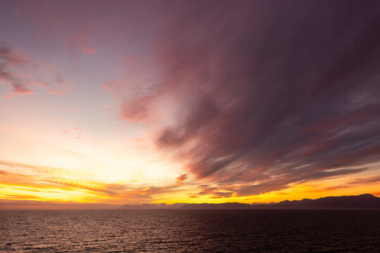sunset clouds over Walker Bay, South Africa
