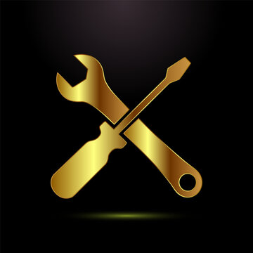 Golden wrench and screwdriver crossing on black background, repair tools icon.