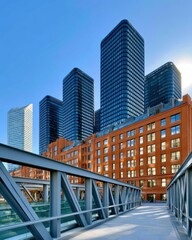 Dynamic urban scene with glass skyscrapers, brick office building and pedestrian bridge in blue light © Georgii