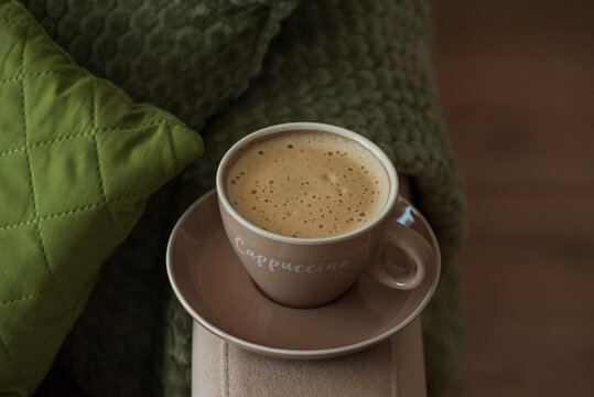 Cappuccino cup creating a cozy morning atmosphere