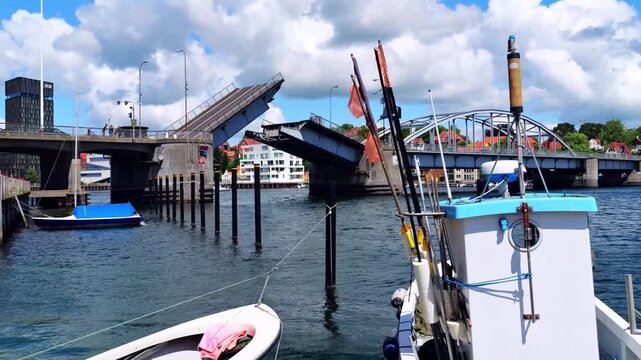 The King Christian X Bridge is opening to allow ships and boats to pass through Flensburg Fjord. Sonderborg, Denmark