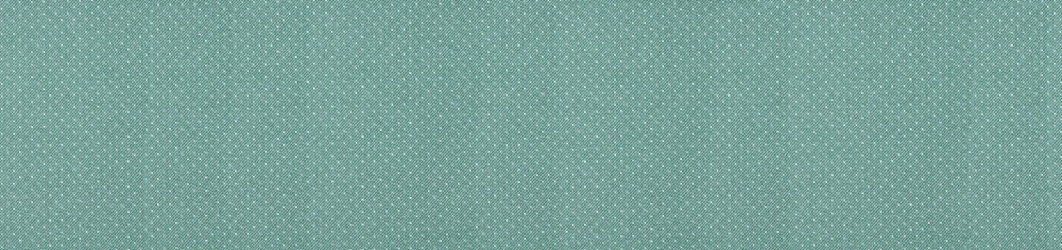 Sage green woven twill fabric texture with a fine speckled white pattern