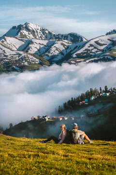 Couple travel in Georgia friends hiking Caucasus mountains together romantic camping vacations tour adventure family healthy lifestyle, man and woman enjoying Gomis Mta view explore Guria region