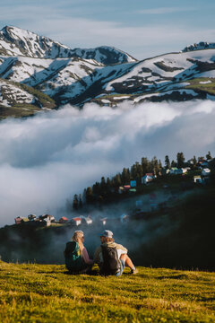 Couple friends travel in Georgia hiking Caucasus mountains together romantic vacations trip adventure family lifestyle, man and woman explore Guria region camping picnic bonding moments in love