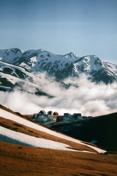 Caucasus mountains and small village houses in Georgia, travel beautiful destinations explore Guria region nature Gomis Mta scenery majestic view