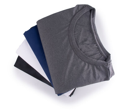 Editable sports t-shirt brand mockup featuring a set of 4 folded t-shirts, top view, isolated on a transparent background.