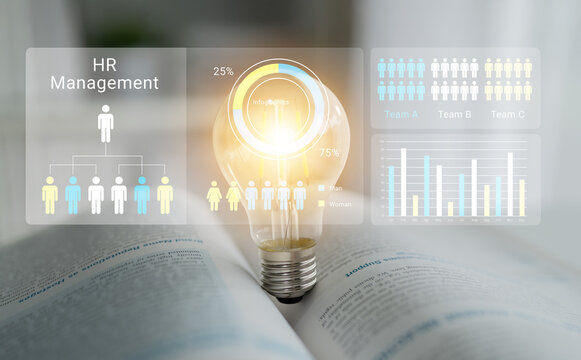 This image represents HR management with a light bulb symbolizing innovation and data visualization, showcasing insights into team dynamics and business growth strategies. Ledger