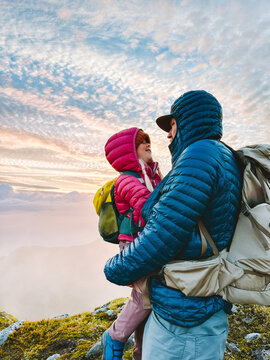 Family hiking vacations - father and child travel outdoor, dad and daughter happy moments together candid emotions parent carrying kid girl on backpacking tour in the mountains, Father's day holiday