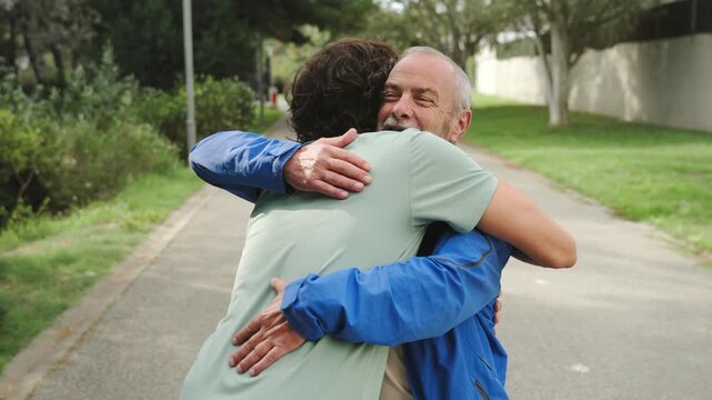 Father and son hug each other with love. Male friendship. Father's day. 