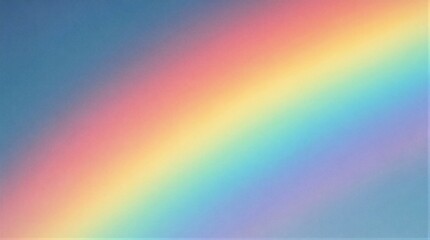 Obraz premium Colorful rainbow arc spanning clear blue sky background