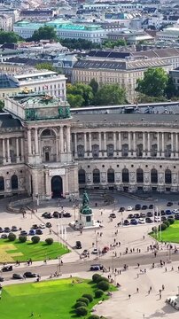Aerial view of Hofburg complex in Vienna focusing on Heldenplatz and Neue Burg wing architecture.