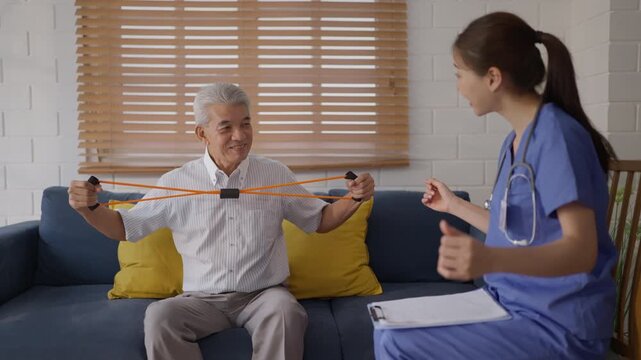 Health insurance with caregiver at home Senior man with nurse using exercise band for home rehabilitation on sofa, healthcare physical therapy with caregiver support for recovery session