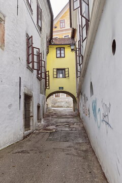 Sector of Klobovsova ulica alley starting from Mestni trg square W side, up to cross underneath an overpass house and go on. Skofja Loka-Slovenia-155