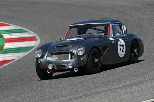 Scarperia, Italy - April 5th 2024: Austin-Healey 3000 Mk I 1962	drive by unknown in action during Mugello Classic 2024 at Mugello Circuit in Italy.