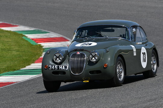 Scarperia, Italy - April 5th 2024: Jaguar XK150 Coupe 1961 drive by unknown in action during Mugello Classic 2024 at Mugello Circuit in Italy.