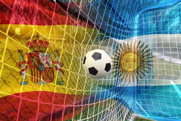 Soccer ball and the flag of Argentina and Spain © erika8213