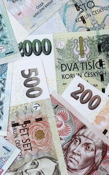 Czech koruna money bills in pile on table. Czech Republic CZK currency cash close up