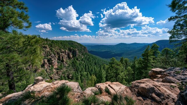 Serene ridge and evergreen slopes along the Mogollon Rim near Payson, Arizona with dramatic cloudscape