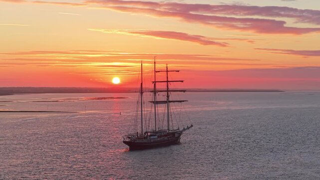 Gulden leeuw tall ship sailing during a golden sunset