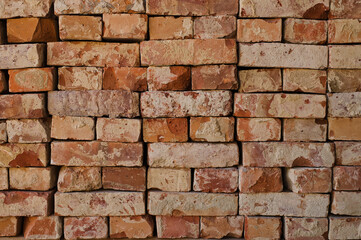 Fototapeta premium Front view of old brick pile