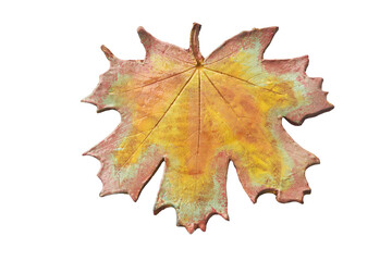 Fototapeta premium Pottery hot pad in the shape of an autumn maple leaf. Png.